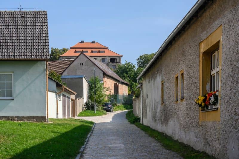 Slepanda a pohled na lovecký zámeček Rudlofa II
